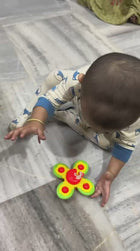 Suction Spinners (Set of 3 ) · Sticks to any surface · Safe for 6M+ Keep Baby Happy Anywhere — No Screen, No Battery Needed