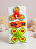 Suction Spinners (Set of 3 ) · Sticks to any surface · Safe for 6M+ Keep Baby Happy Anywhere — No Screen, No Battery Needed